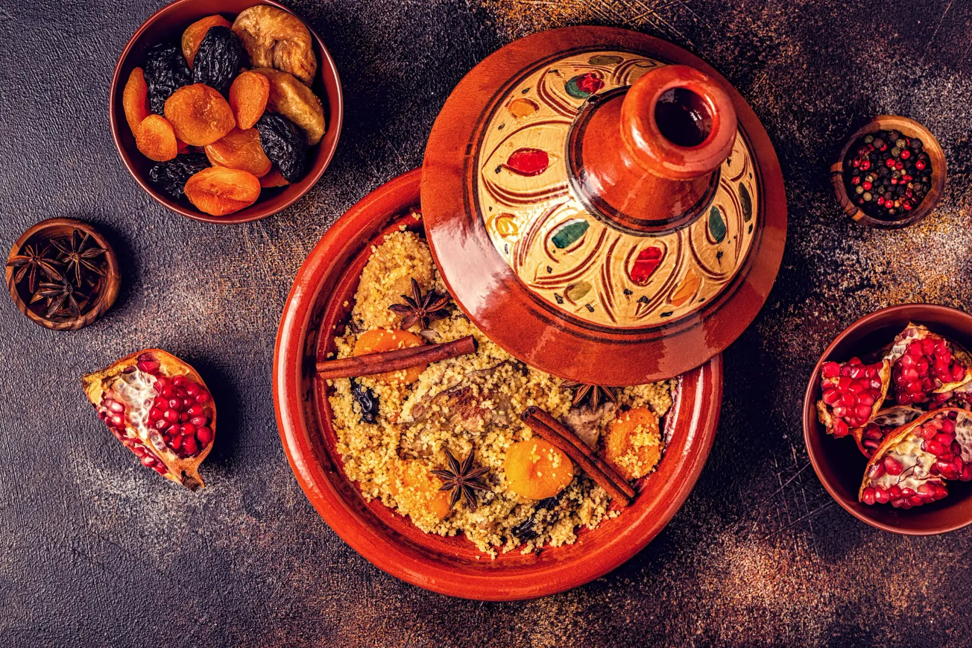 Moroccan Tagine from Aladdin Mediterranean Catering Houston Traditional Moroccan tagine with couscous, dried fruits, and spices – Mediterranean catering dish at Aladdin Houston