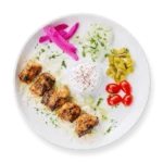 Chipotle Chicken Kebab from Aladdin Mediterranean Cuisine—smoky, flame-grilled chicken skewer served with vegetables