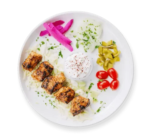 Chipotle Chicken Kebab from Aladdin Mediterranean Cuisine—smoky, flame-grilled chicken skewer served with vegetables
