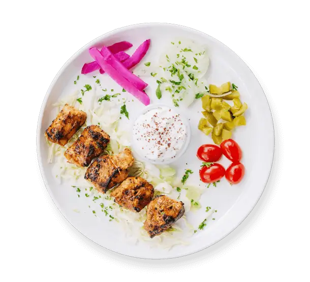 Chipotle Chicken Kebab from Aladdin Mediterranean Cuisine—smoky, flame-grilled chicken skewer served with vegetables