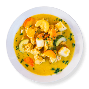 Curry chicken plate from Aladdin Mediterranean Cuisine—chicken breast in creamy turmeric-ginger curry with potatoes, carrots, and cranberry-almond rice