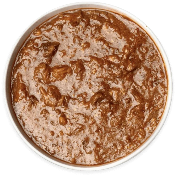 Pomegranate Eggplant stew in a white bowl