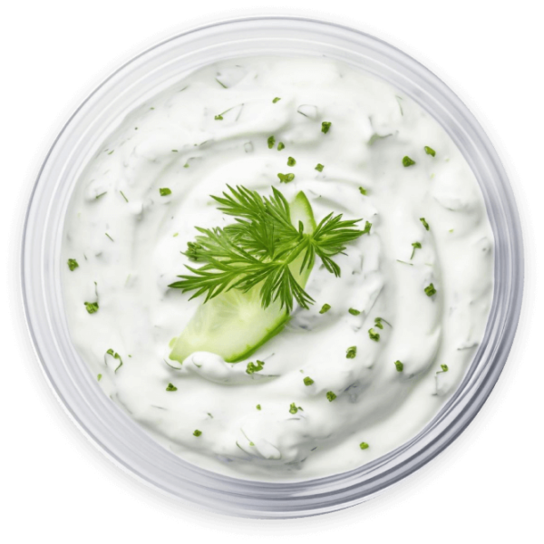 Tzatziki Dip with fresh dill in a white bowl
