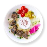 Filet Steak Kabob -grilled filet steak beef kabob from Aladdin Mediterranean Cuisine, served with basmati rice and roasted vegetables