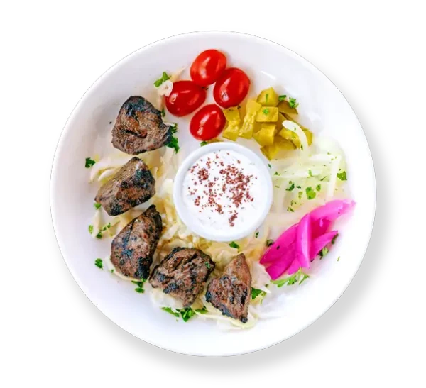 Filet Steak Kabob -grilled filet steak beef kabob from Aladdin Mediterranean Cuisine, served with basmati rice and roasted vegetables