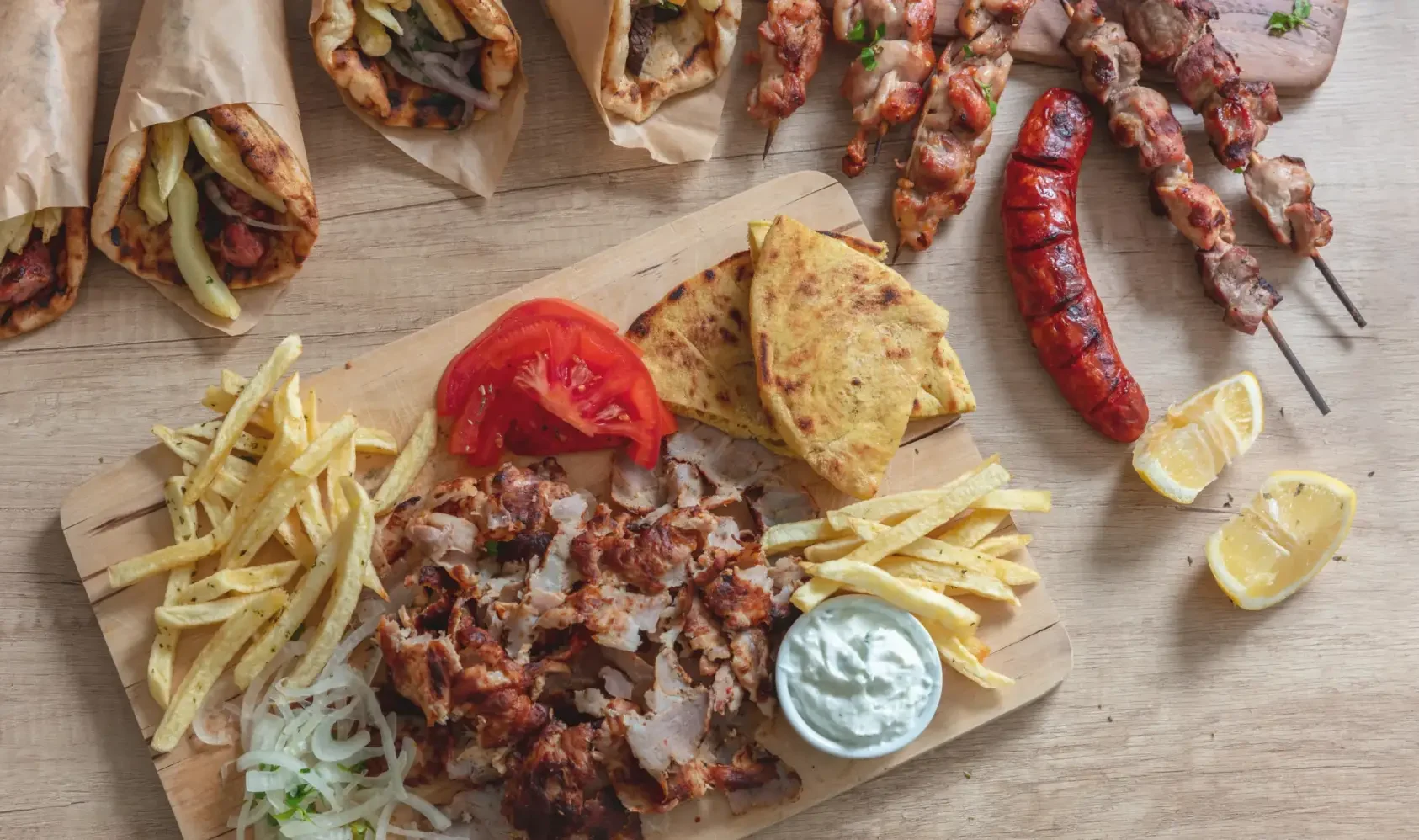 Greek vs Mediterranean Food a variety of Mediterranena food on a cutting board