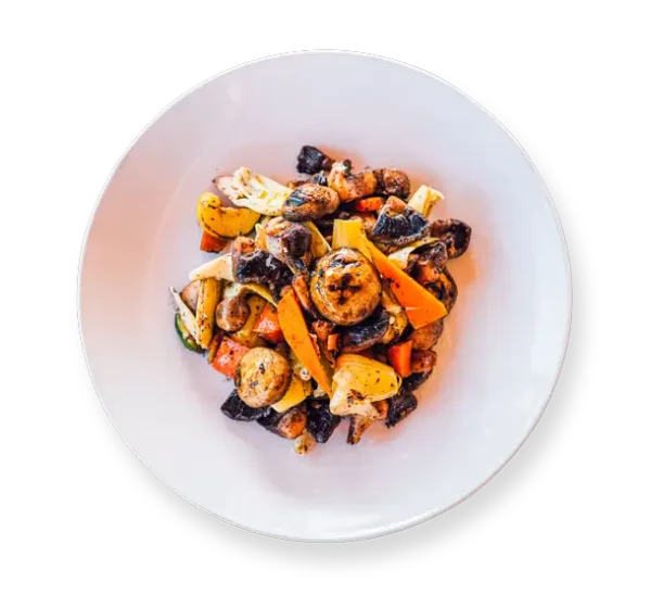 Marinated mushroom and artichoke salad tossed with grilled carrots, squash