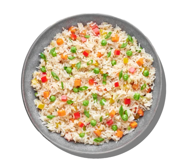 Vegetable rice colorful rice blended with carrots, peas, bell peppers, and Mediterranean herbs at Aladdin Houston