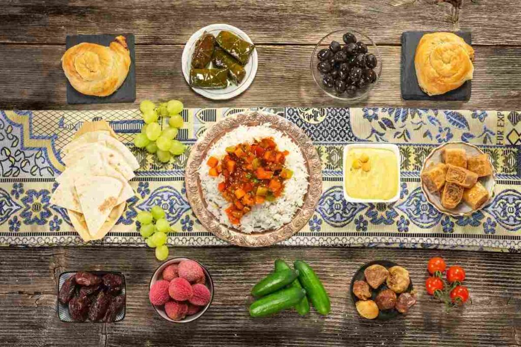 Traditional Mediterranean cuisine platter served in Houston, TX with grape leaves, rice, olives, and hummus