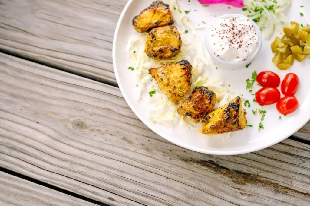 Grilled saffron chicken kabob served at Aladdin Mediterranean Cuisine, a go-to spot for healthy Mediterranean food inHouston diners love.