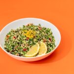 Fresh tabbouleh salad made with parsley, bulgur, tomatoes, and lemon dressing at Aladdin Mediterranean Cuisine Houston